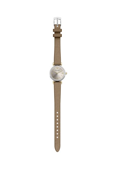 Round silver watch with a textured light brown leather strap, featuring a minimalist dial with gold accents and Roman numeral hour markers.