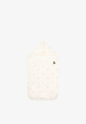 Couverture douce pour bébé en tissu crème avec un motif floral subtil, haut à capuche, et une petite broderie de tigre sur le côté supérieur droit.