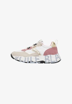White and pink low-top sneaker with gold accents, chunky sole featuring large gray lettering, and black tread on the bottom.