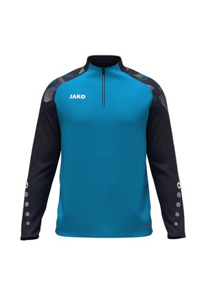 Haut de sport bleu et noir à manches longues avec une fermeture éclair au quart, des accents d'épaule à motifs et le logo JAKO sur la poitrine gauche.