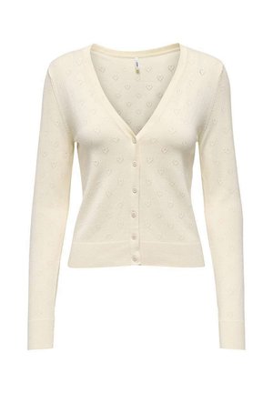 Cardigan crème à manches longues, boutonné, avec col en V et motif subtil en forme de cœur tricoté sur l'ensemble du tissu.