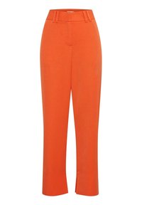 Pantaloni su misura arancioni con vita alta, caratterizzati da un frontale piatto, leggere fessure alle caviglie e una texture liscia.