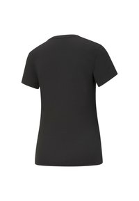 Camiseta negra de manga corta con cuello redondo, hecha de una suave tela de algodón. Presenta una textura lisa sin patrones o acentos visibles.