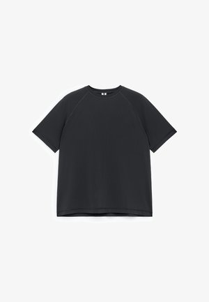 Black short-sleeve t-shirt with a round neck, raglan sleeves, and a smooth texture. No patterns or embellishments. Simple, straight cut.