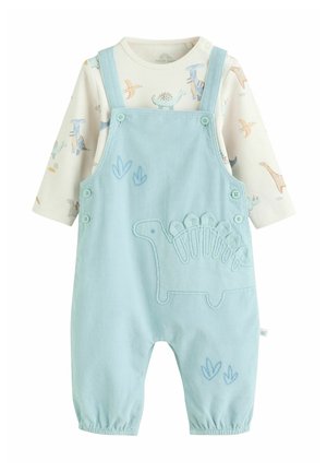 Hellblaue Baby-Latzhosen mit gesticktem Dinosaurier und Fußabdrücken, kombiniert mit einem cremefarbenen Langarmshirt mit bunten Dinosaurier-Prints.