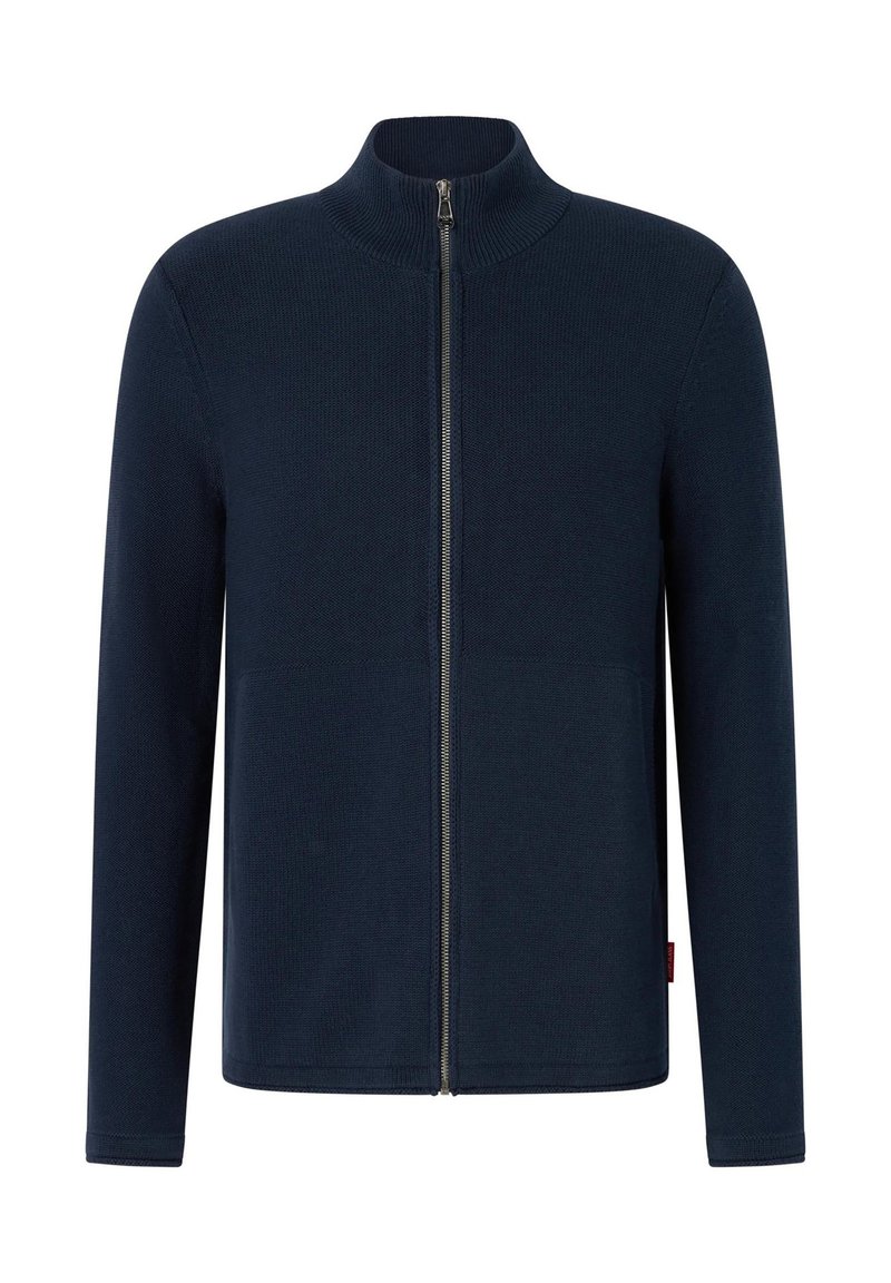 Tamsiai mėlynas užsegamas užtrauktuku džemperis, su siūlėmis, aukštu apykakliu, ilgomis rankovėmis ir priekinio užtrauktuku, pagamintas iš minkšto megztinio medžiagos. Minimalistinis dizainas.