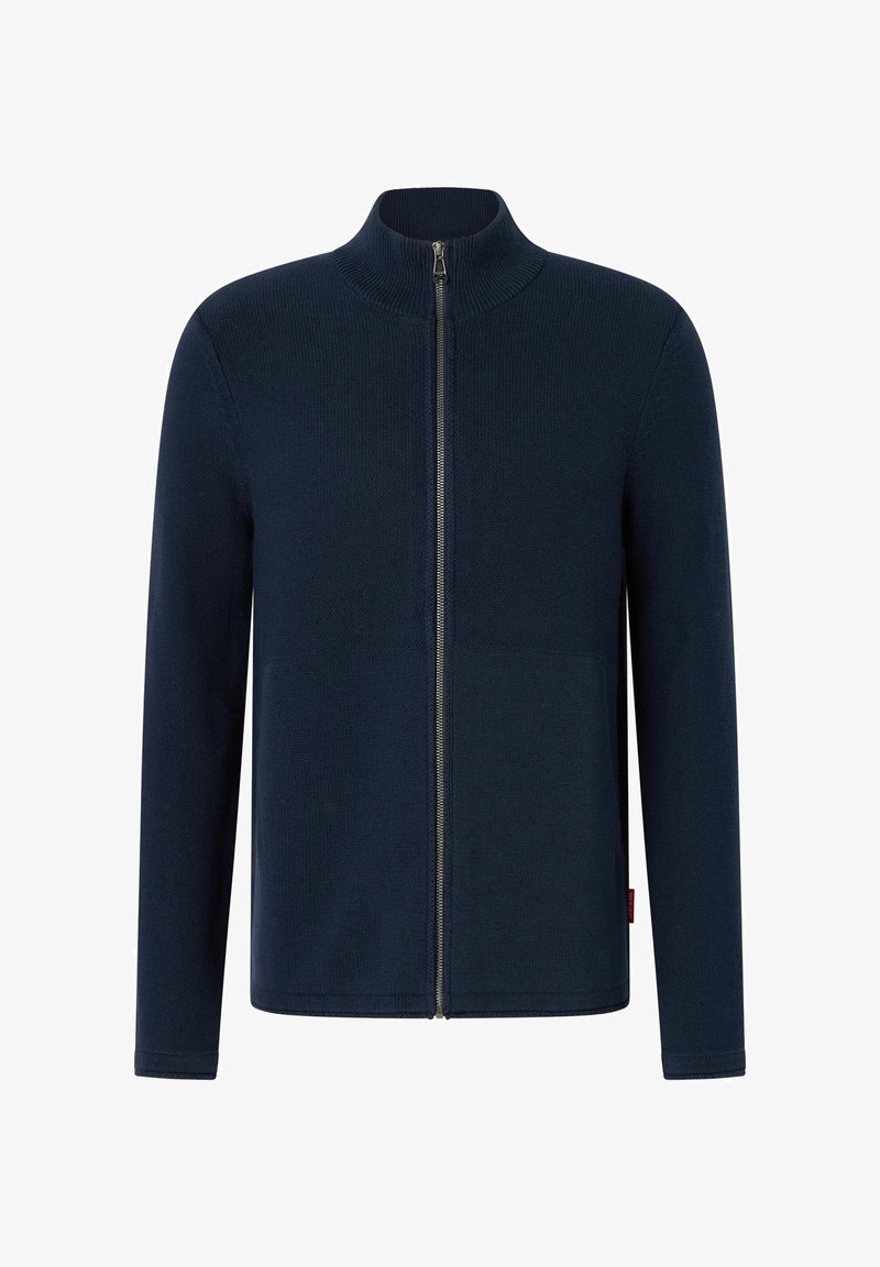 Námořnická bunda na zip, žebrovaná struktura, vysoký límec, rukávy na celou délku a přední zip, vyrobená z měkkého pleteného materiálu. Minimalistický design.