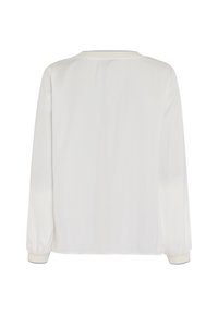 White long-sleeve blouse featuring a round neck, soft texture, and elasticized cuffs. Simple design with a smooth back.