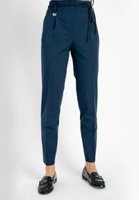 STING - Spodnie materiałowe