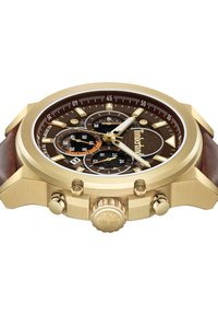 Orologio cronografo dorato con quadrante marrone; sottodials neri; cinturino in pelle marrone; corona prominente con logo; indici e lancette in oro.
