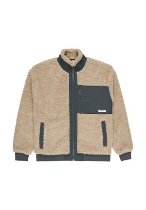 Giacca in finta pelliccia beige con zip frontale, colletto alto e dettagli in nylon grigio scuro. Presenta due tasche anteriori e una tasca sul petto.