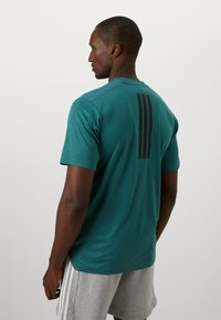 adidas Performance POWER TEE - T-shirt de sport - preloved teal