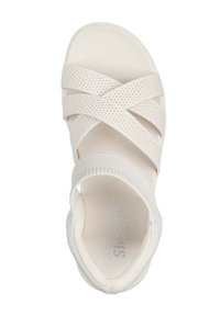 Sandalias de color beige claro con un diseño entrelazado y correas de malla, una plantilla acolchada y una suela suave. Parte superior texturizada para una mayor transpirabilidad.