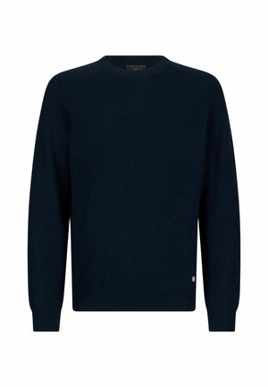 Navy blue knitted sweater with a round neckline, ribbed texture, long sleeves, and a small fabric tag at the bottom left hem.