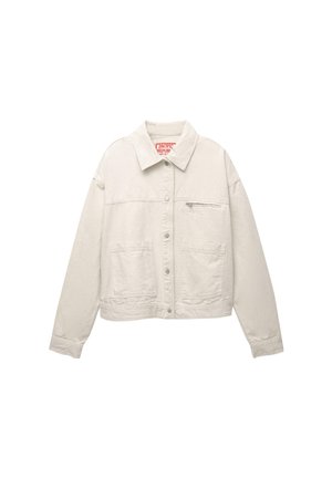 Light beige denim jacket with a collared neckline, button front, two large front patch pockets, and a small zippered chest pocket.