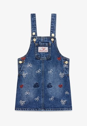Vestito salopette di jeans blu, con fiocchi ricamati in rosso e bianco, spalline regolabili, tasca frontale e etichetta brandizzata.