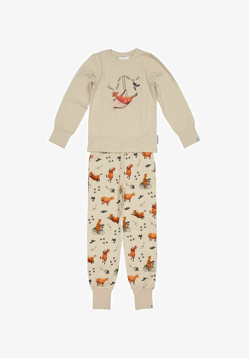 Lasten vaaleanbeige yöpuku pitkillä hihoilla, jossa on lehmäkuvasto, joka keinuu ja ajaa pyörällä, mustarastaiden ja tassunjälkien korostuksilla.