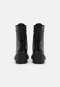 Tamaris Botines con plataforma - black