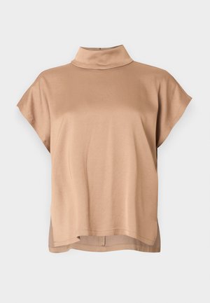 Short-sleeved top in light brown fabric, featuring a high collar, relaxed fit, and hemline slightly longer at the back. Smooth texture.