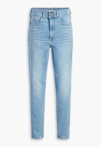 Jeans skinny de denim azul claro con cintura alta, que cuentan con cinco bolsillos y cierre de botón. Desgaste sutil y textura suave.