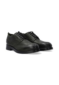 Groene leren dresschoenen met brogue-details, ronde neus, zwarte veters en een platte zwarte zool. Ontworpen in een klassieke stijl.