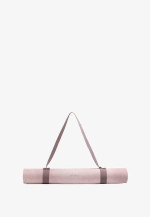 Rolled light pink yoga mat with two dark pink straps and a shoulder carrying strap, branded "OYSHO" in the center.