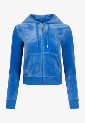 Blue velour zip-up hoodie with a front pocket, drawstrings, ribbed cuffs, and a small logo on the chest. Soft texture and relaxed fit.
