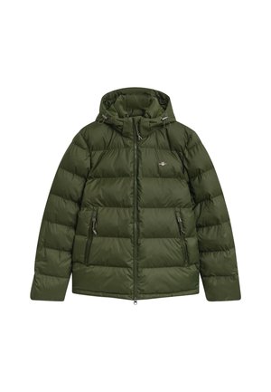 Veste matelassée verte avec capuche, dotée d'une fermeture éclair, de deux poches avant zippées et d'un design matelassé. Texture légère et lisse.