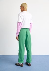 adidas Originals JOGGERS - Dresside alumine osa - preloved green