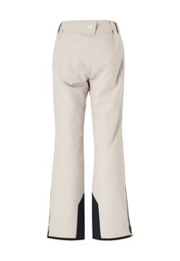 Lichtbeige broek met een wijdere pijp en zwarte accenten bij de zoom. Gemaakt van een glad, duurzaam materiaal. Logo detail aan de achterkant van de taille.