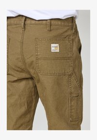 Geselecteerd, tostado toasted brown