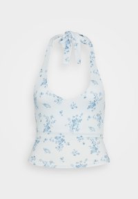 Lyseblå halterneck topp laget av myk stoff, med et blomstermønster i en mørkere blå nyanse. Den har en tettsittende design med peplumkant og knytedetalj.