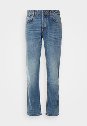 Light blue denim jeans with straight legs, five pockets, contrasting stitching, and a faded finish. Features a button and zip fly closure.