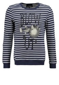 Sudadera a rayas azul marino y blanca con cuello redondo, que presenta un gráfico de un pez globo y el texto "BLOW UP" en letras negras en negrita.