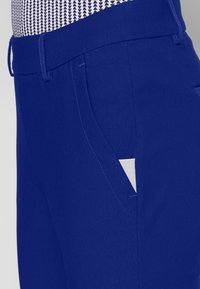 Kjus WOMEN IKALA 7/8 TREGGINGS - Nohavice - atlanta blue