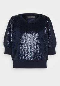 Haut bleu marine à sequins avec manches courtes et encolure arrondie. Comprend une partie supérieure texturée et des poignets côtelés à l'ourlet.
