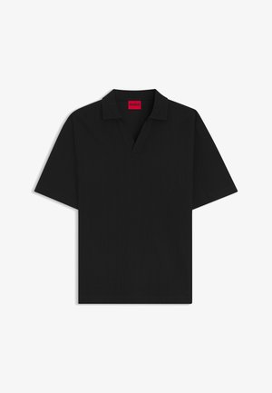 Black short-sleeve polo shirt with open collar and red "HUGO" label inside the neckline on a white background.