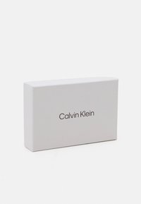 Calvin Klein DAILY SMALL ZIP AROUND - Novčanik - black