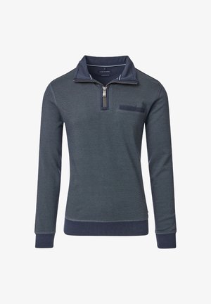 Ciemnoniebieski sweter z półzamkiem i kołnierzem, wykonany z teksturowanej tkaniny, z długimi rękawami oraz kieszenią na piersi z ciemnym wykończeniem.