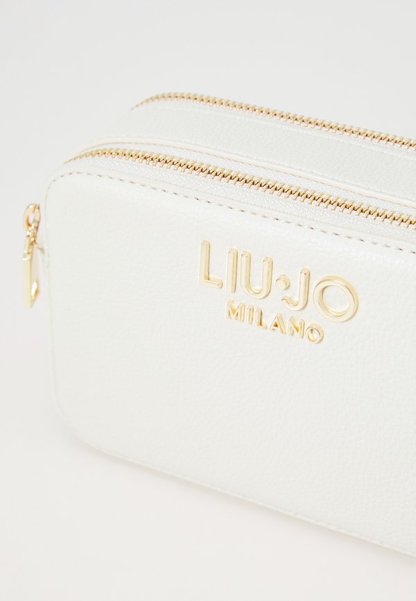 CAMERA CASE - Cross body bag - cream3