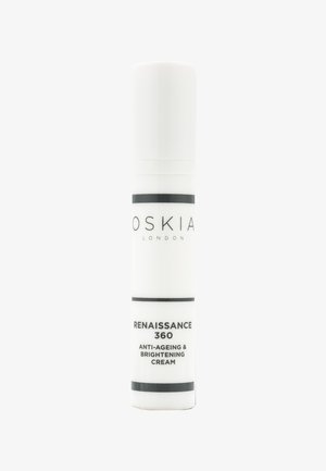 Flacon cylindrique blanc de crème anti-âge et éclaircissante Oskia Renaissance 360 avec texte noir et bandes sur fond blanc.