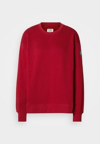 Roter Sweatshirt aus Baumwollmischung mit langen Ärmeln, rundem Halsausschnitt, gerippten Bündchen und einem Aufnäher am linken Ärmel.