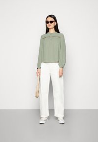JDY LION LIFEL/S PLACKET - Blusa - sea spray