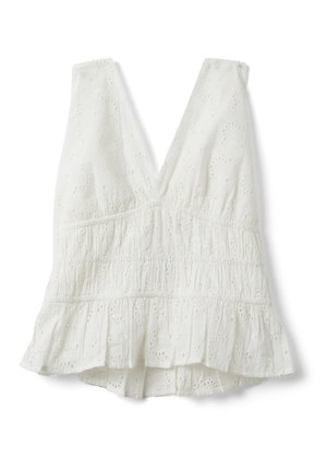 Blusa blanca sin mangas con escote en V profundo, cintura fruncida elástica, bordado de ojales y detalle de volante en el dobladillo.