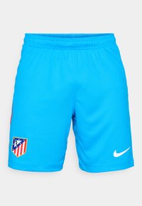 Lysblå atletiske shorts lavet af åndbart stof med elastisk talje, der har et teamlogo-patch og en hvid Nike swoosh.