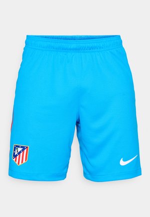 Pantaloni scurți atletici de culoare albastru deschis, dintr-un material respirabil, cu un elastic în talie, având un patch cu logo-ul echipei și un swoosh alb Nike.