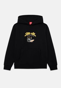 Čierna mikina s kapucňou vyrobená z bavlny, s predným vreckom. Obsahuje farebný grafický dizajn s textom "Santa Cruz Skateboards" a kreslený obrázok.