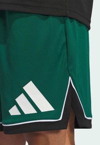 adidas Performance BADGE 9IN - Urheilushortsit - team dark green black