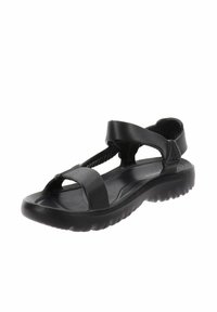 Sandalo in gomma nera con design a T-strap e cinturini larghi texturizzati. La suola presenta un motivo a zigzag per garantire aderenza.