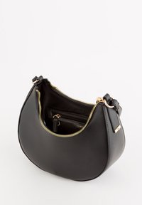 Carpisa Axelremsväska - black